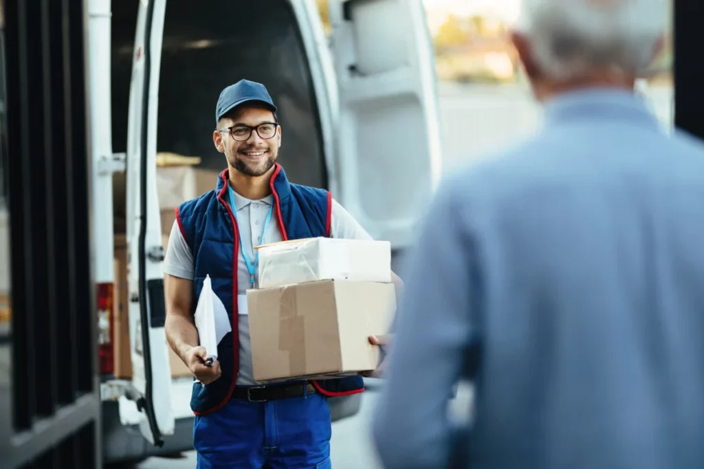 entregador-feliz-carregando-pacotes-ao-fazer-entrega-em-domicilio-para-seu-cliente-lalamove como funciona